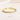 A gold eternity ring featuring a row of round white opal gemstones, displayed on a soft cream-colored surface with a text overlay reading 'OCTOBER WHITE OPAL'.